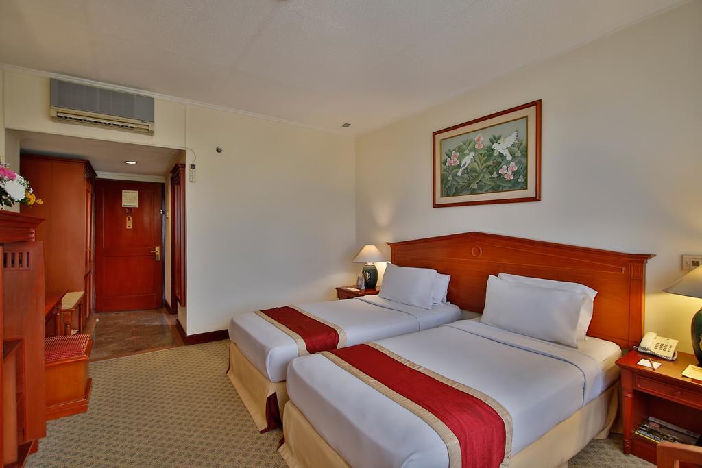 The Jayakarta Suites Бандунг Номер фото